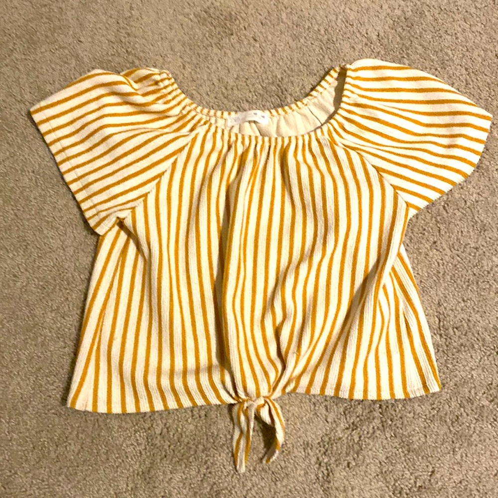 I am selling a yellow, striped t-shirt from Zara.